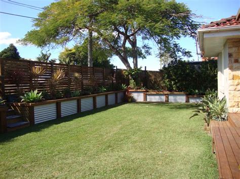Maybe you would like to learn more about one of these? Low corrugated iron and wood retaining wall | Landscaping ...