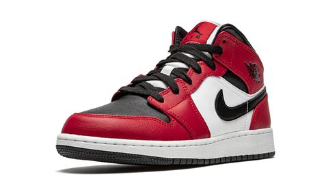 Jumpman branding adorns the woven tag stitched onto the padded white nylon tongue, while a classic jordan wings logo is. Jordan 1 Mid Chicago Black Toe (GS) - 554725-069 - Restocks