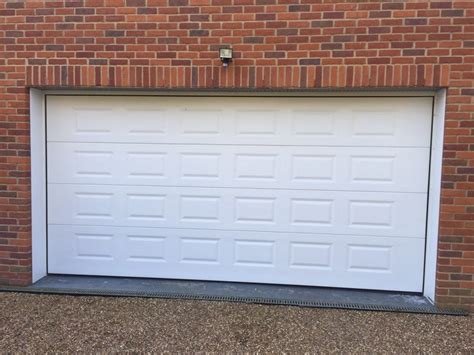 Looking for a garage door supplier and installer in the buckinghamshire area? Georgian Sectional Garage Door in Gerrards Cross | Shutter ...