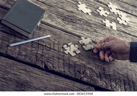Hand Businessman Matching Two Puzzle Pieces Stock Photo 383615968