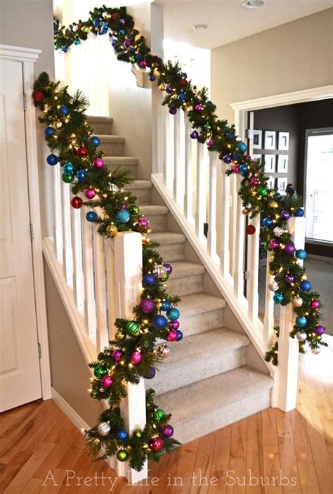 I lived in an apartment for a year as i made the last year, i decided to weave the rainbow garland into a pine garland on my staircase banister. 40+ Festive Christmas Banister Decorations Ideas - All ...