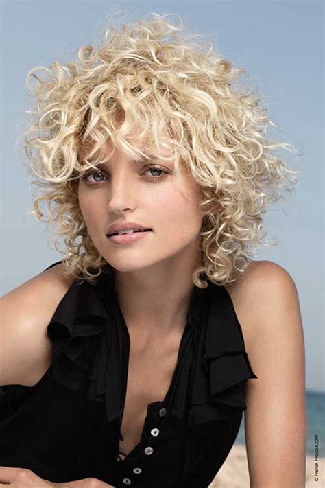 For hairstyles like this one, start with a volumizing mousse like bed head by tigi foxy curls mousse to prep. 15 Short Haircuts For Curly Frizzy Hair | Short Hairstyles ...