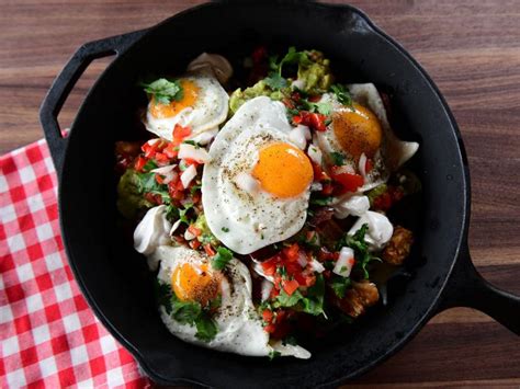 Totchos or tater tot nachos are simply a twist on the classic nachos. Breakfast Totchos Skillet Recipe | Ree Drummond | Food Network