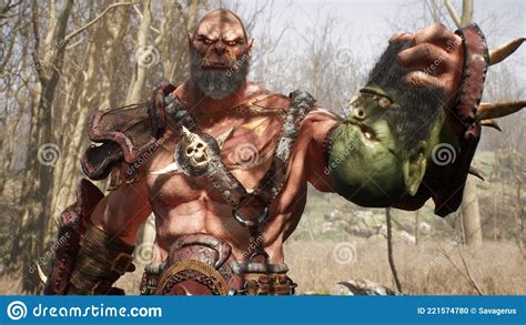 A Formidable Orc Warrior Lifts The Severed Head Of A Defeated Enemy