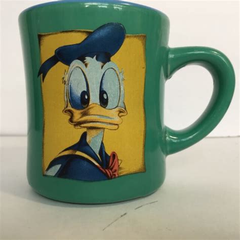 Disney Donald Duck Teal Green Yellow Coffee Cup Mug Ceramic Holds 8