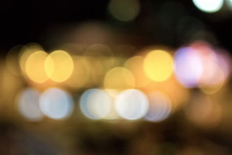 Abstract Background Of Blurred Lights With Bokeh Effect Free Photo