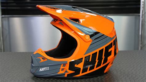 Justin shows you how to properly put on a motorcycle helmet. Shift Assault Race Helmet | Motorcycle Superstore - YouTube