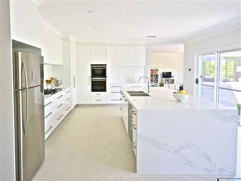 Beyond the kitchen, caesarstone® can be used for custom furniture, like this vanity tabletop. Timeline Photos - Bella Vie Interiors | Facebook | Caesarstone calacatta nuvo, Calacatta nuvo ...