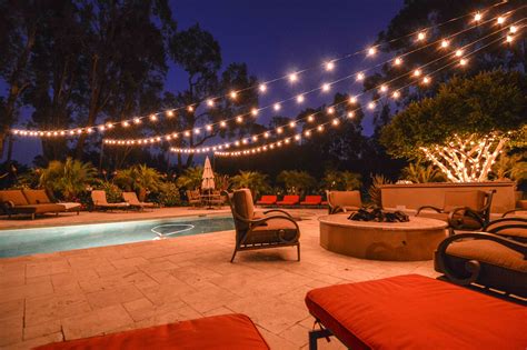 This way you can take a speaker on your next trip to the river, too. Market lights at a backyard wedding in a starburst display over a pool. | Market Lights | String ...