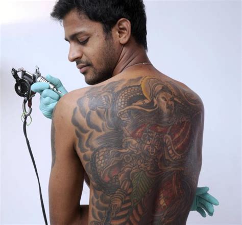 Wiz khalifa's tattoos were always part of the plan. Redpig Studio Tattoo: popular wiz khalifa tattoos 2012