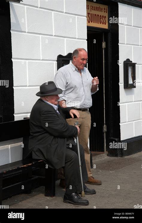 Two Old Irish Men Outside A Pub Strand Street In An Daingean Dingle