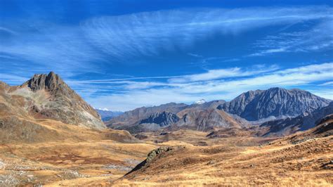 Landscape View Of Brown Sands Mountains Under Blue Clouds Sky 4k Hd