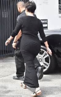 Kris Jenner Showcases Her Curvy Derriere In A Skintight Black Dress As