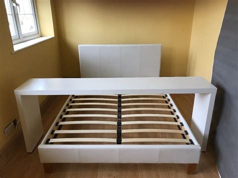 Over bed laptop table,adjustable tilt rolling removable overbed desk bedside table with wheels and heat emission hole,for sofa,bed,chair side (black) 3.0 out of 5 stars 1 1 offer from $59.99 Ikea Malm White Double Bed + Over bed table | in Pontefract, West Yorkshire | Gumtree