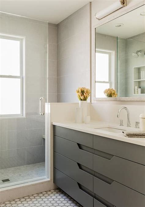 Our stylish bathroom vanity units are available in a range of designs to suit both contemporary and toilet and basin vanity units are the ultimate in convenience for your bathroom and our white floorstanding bathroom vanity units are certainly no. Modern Gray Washstand with Hex Tile Floor - Modern - Basement