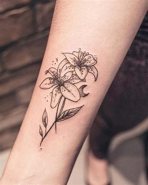 250 lily tattoo designs with meanings 2020 flower ideas and symbols lily flower tattoos lily