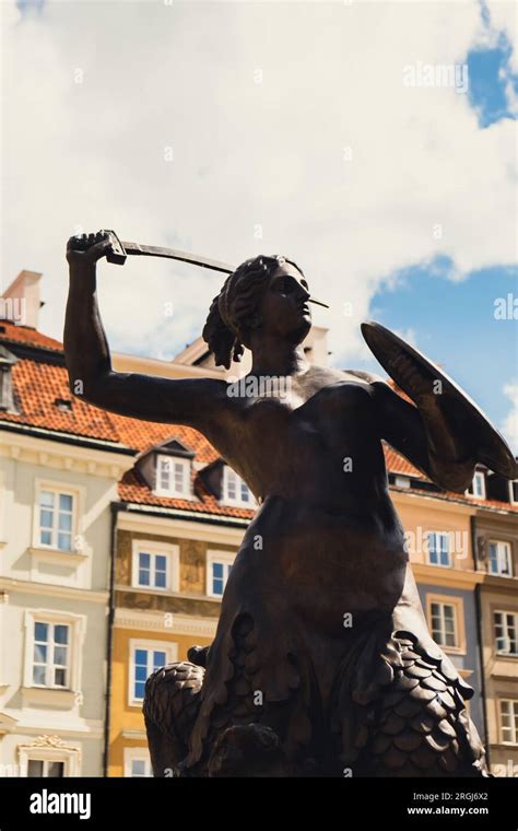 The Statue Of Mermaid Of Warsaw Polish Syrenka Warzawska Symbol Of