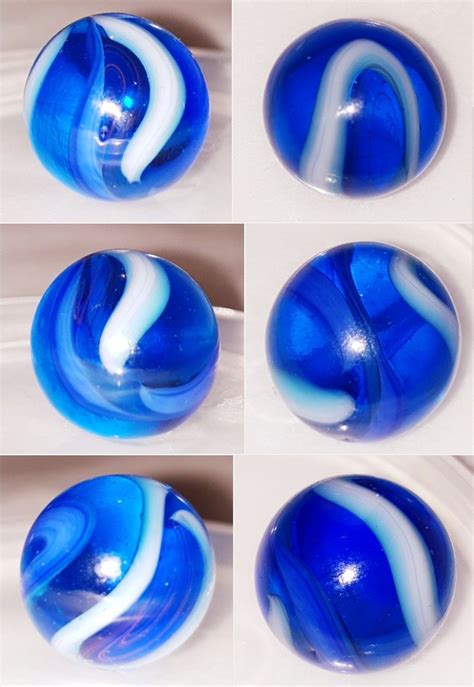vintage glass toy marble blue white and red glass toys glass marbles paperweights