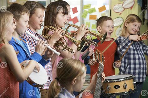 Group Of Students Playing In School Orchestra Together Stock Image