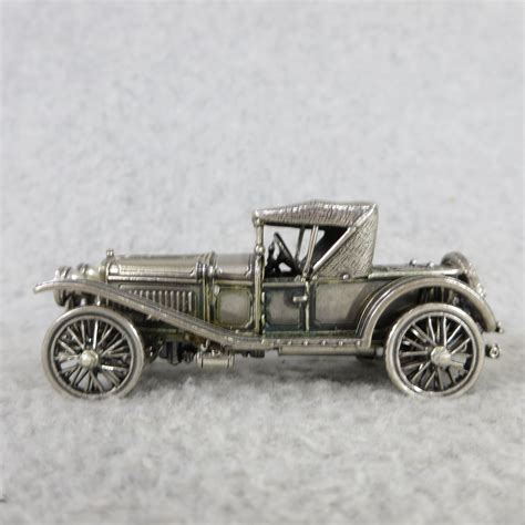 It is mint and factory sealed in the original shipping box from franklin mint and includes all the paperwork. 1913 CADILLAC COUPE World-Famous Sterling Silver Vintage ...