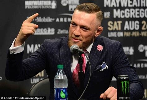 Conor Mcgregor Wears Suit Pinstriped With F K You To Insult Floyd Mayweather Elite Readers