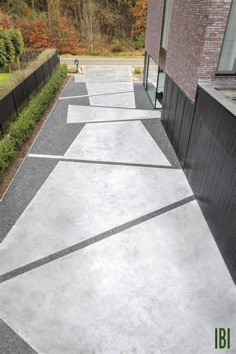 ontwerp en realisatie van oprit met gepolierde beton in speelse vlakken c bert breugelmans