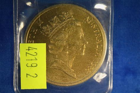 Lot - 1988 FIVE DOLLAR COMMEMORATIVE COIN