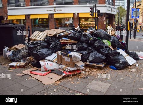 London, UK. 27th September 2023. Huge piles of garbage line the streets