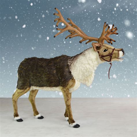 At nearly four feet high, this christmas reindeer statue will make your heart glow at viewing your holiday decorations. Hansa Ride-On Nordic Reindeer with Halter - 65' Reindeer