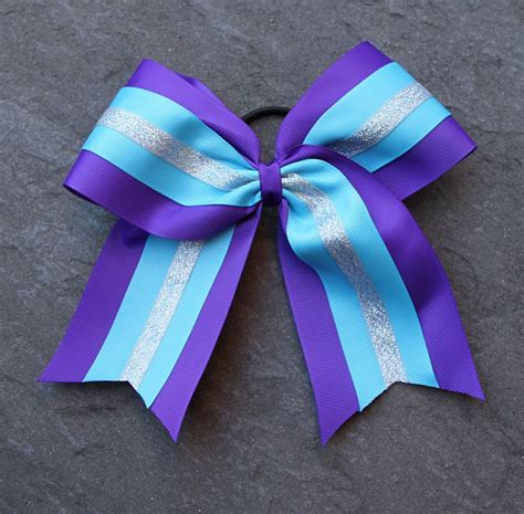 Maybe you would like to learn more about one of these? Cheerleading Bow Instructions | Sarah Lauren | Cheer hair bows, Cheerleading bows, Diy hair bows