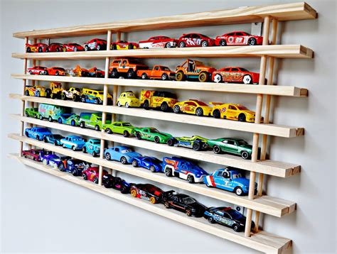 To make this jewelry display case look more beautiful, you can paint the background with soft pastel colours. DIY Matchbox Car Garage **UPDATED** | A Lo and Behold Life