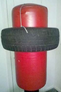 Heavy duty punching bag stand with 4 sand bags : Homemade Punching Bag Ideas - RossTraining.com