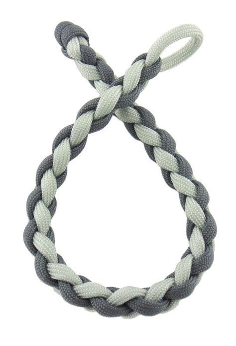 Braiding paracord in this way is fairly common. Four Strand Diamond Braid · Extract from Crafting with ...