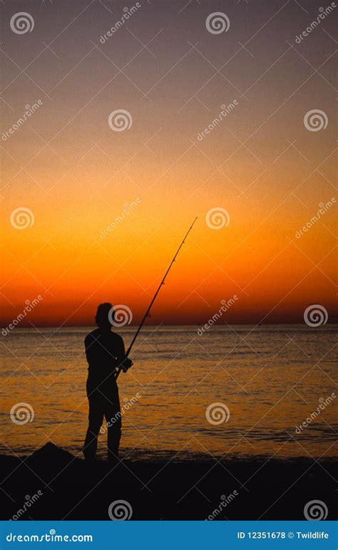 Surf Fisherman At Sunset Stock Photo Image Of Sunrise 12351678