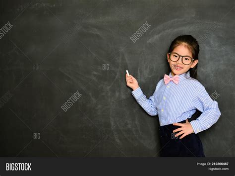 smiling little teacher image and photo free trial bigstock