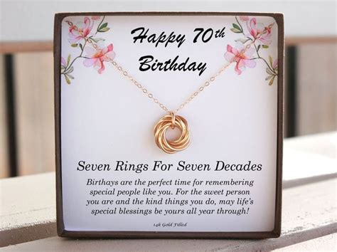 A Happy Birthday Card With A Gold Necklace On Its Front And The Words