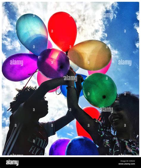 Children Playing With Colourful Balloons Stock Photo Alamy