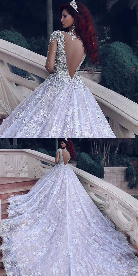 Long sleeve wedding dresses are a great choice for brides getting married in the autumn and winter, as they provide more warmth than their strapless counterparts and save you needing to look for a wedding coat or cover up. Sequined Beaded Long Sleeve Wedding Dress With Long Train ...