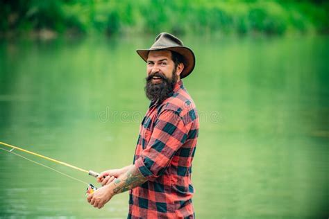 Fisherman Man On River Or Lake With Fishing Rod Stock Image Image Of