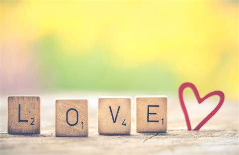 Photo Of Scrabble Letter Tiles Forming The Word Love · Free Stock Photo