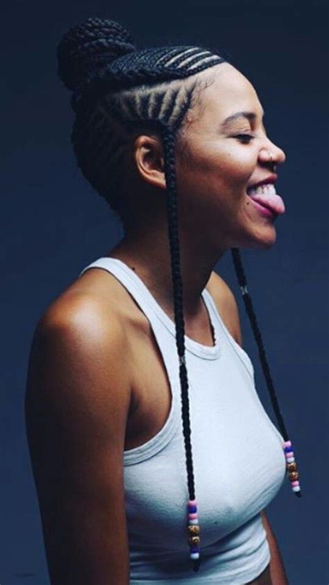 This hairstyle was popular in america (for straight hair textures) during the late 1980s and early hair that is shaved or buzzed on the sides leaving a strip of hair in the middle. @shomadjozi | Hair styles