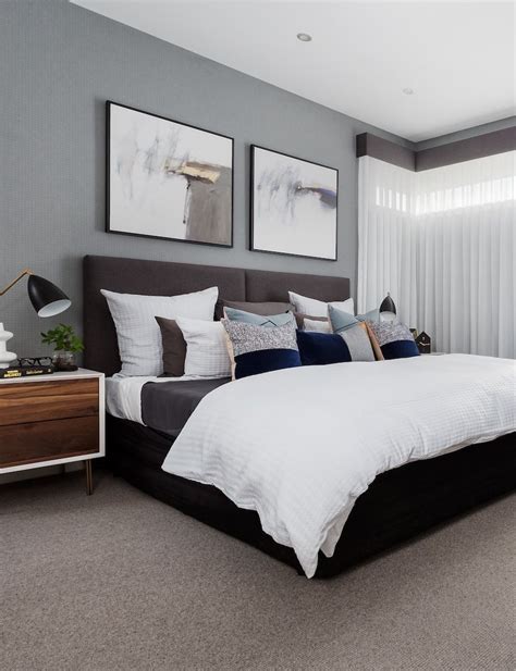 Modern Master Bedroom With Grey Wallpaper Design And White Bedding From