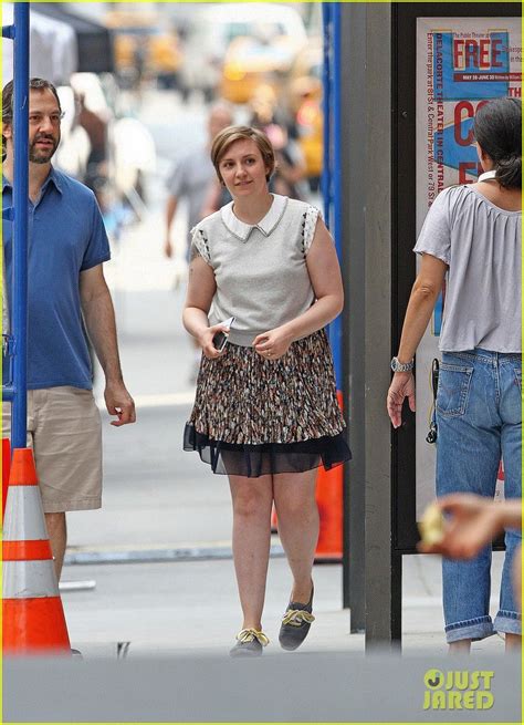 Full Sized Photo Of Lena Dunham Charges Cameras With Judd Apatow 01