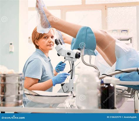 Doctor Examining Woman With Colposcope In Modern Clinic Stock Image Image Of Apparatus