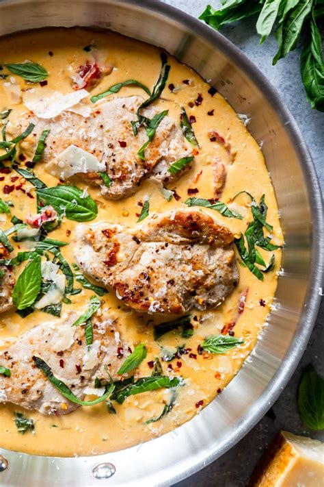 Main thing with thin cuts of meat is not to overcook them, but with pork, as you probably know, it is important it's cooked all the way through. Creamy Parmesan Basil Skillet Pork Chops | Recipe in 2020 ...