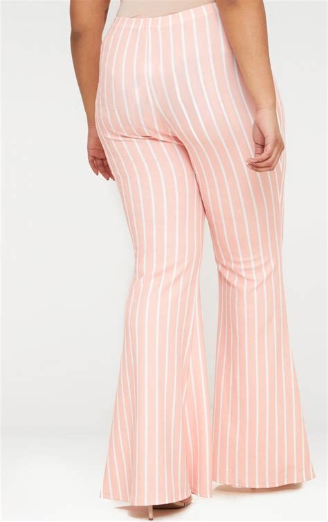 Plus Pink Stripe Flared Pants Prettylittlething Uae