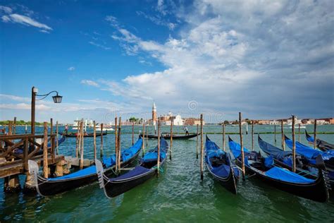 Gondolas And In Lagoon Of Venice By Saint Mark San Marco Square