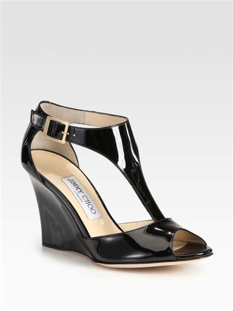 Jimmy Choo Token Patent Leather Tstrap Wedge Sandals In Black Lyst