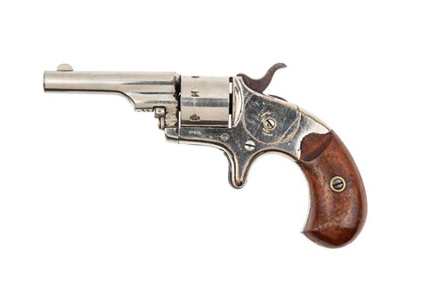 Four Hand Guns A Colt Open Top 22 Pocket Revolver