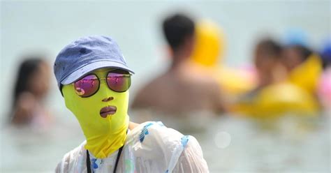Return Of The Facekini Chinas Most Terrifying Swimwear Trend Hits The